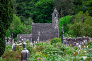 Old stone church in the monastery of Glendalough in Ireland Old stone church in the monastery of Glendalough in Ireland